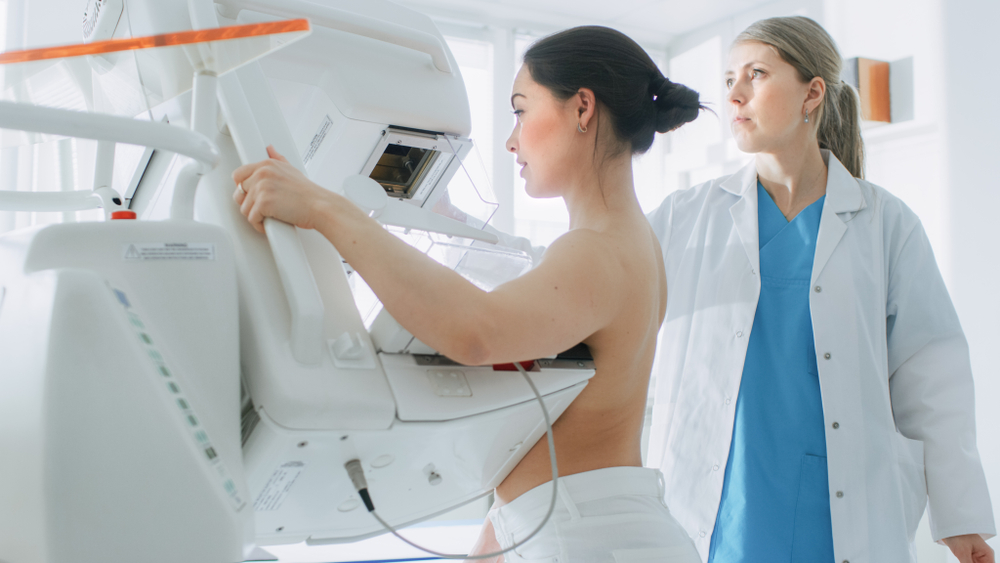 female patient undergoing Mammogram screening procedure
